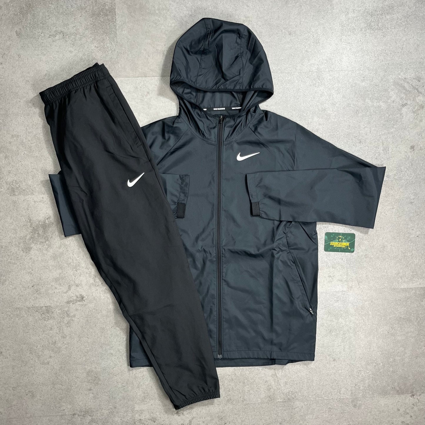 Nike Essential Windbreaker “Black” & Woven Bottoms Set